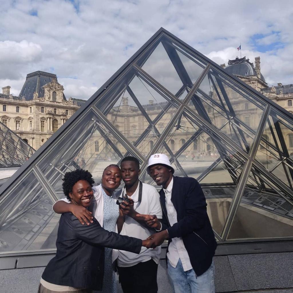 Martha, her two brothers and Mother sightseeing after getting adjusted to their new environment and new beginnings