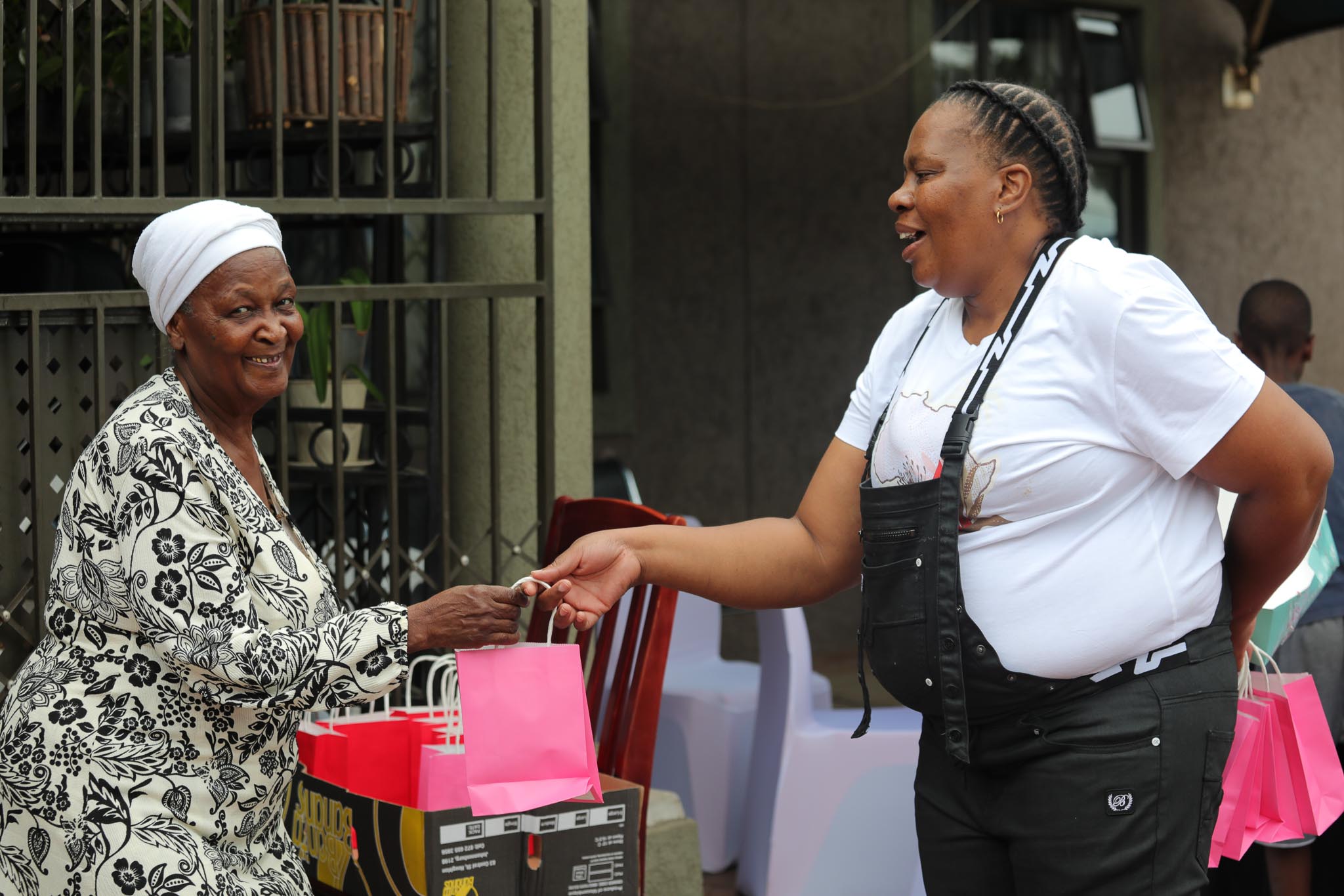 Volunteers handing out presents